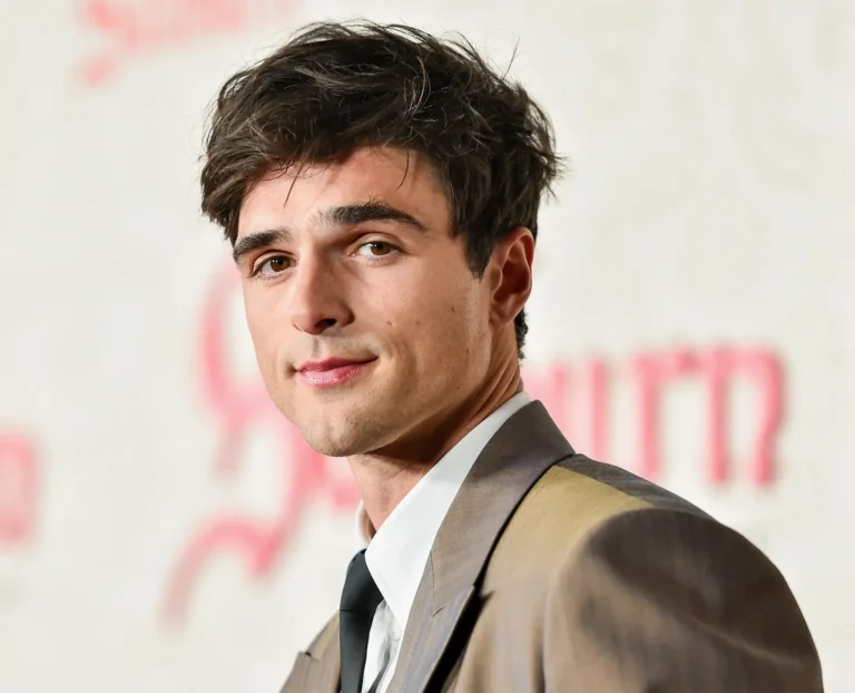 Jacob Elordi portrait in a neutral background wearing a classic suit. Jacob Elordi movies and tv shows
